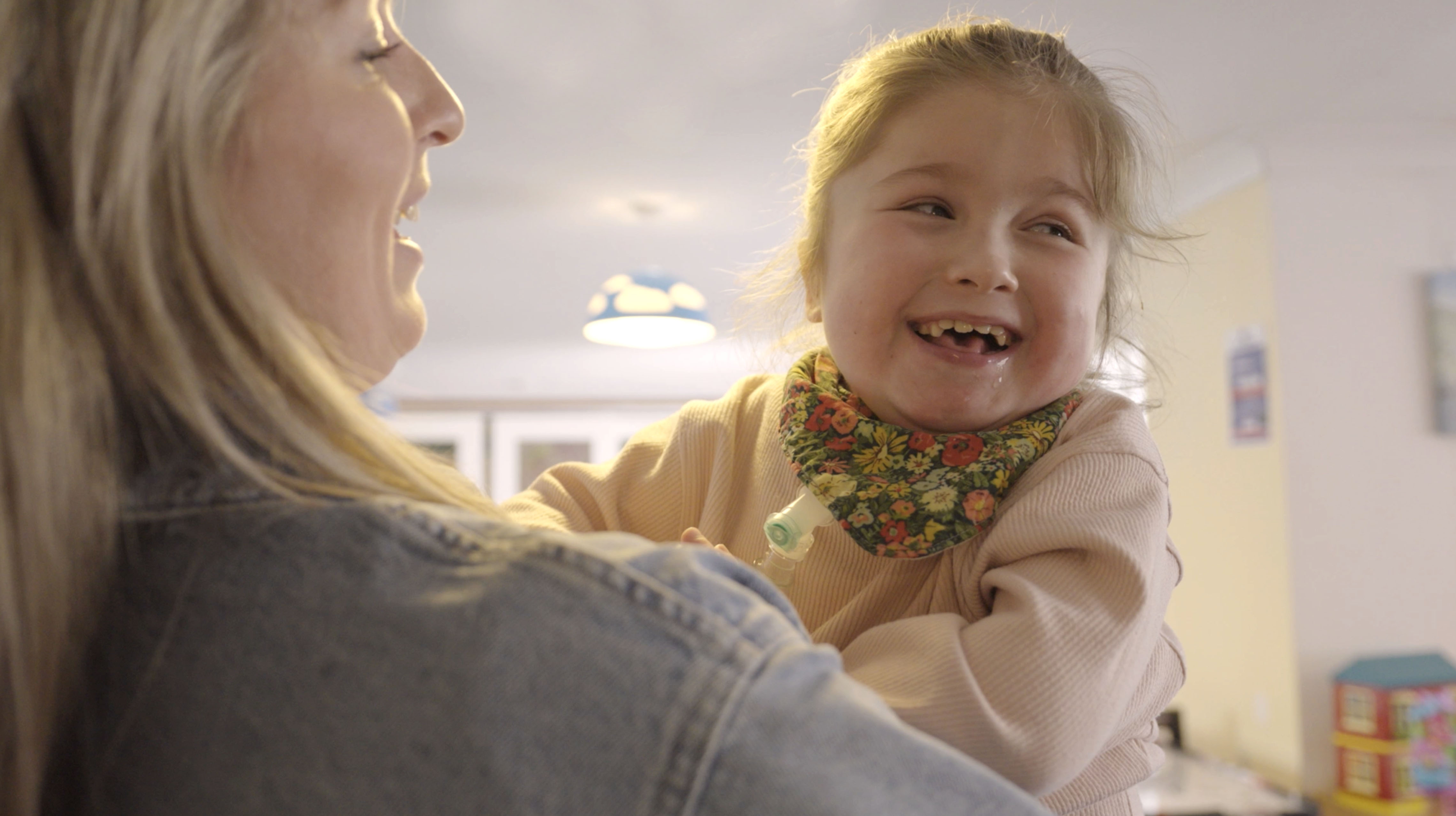 Child and mum smiling