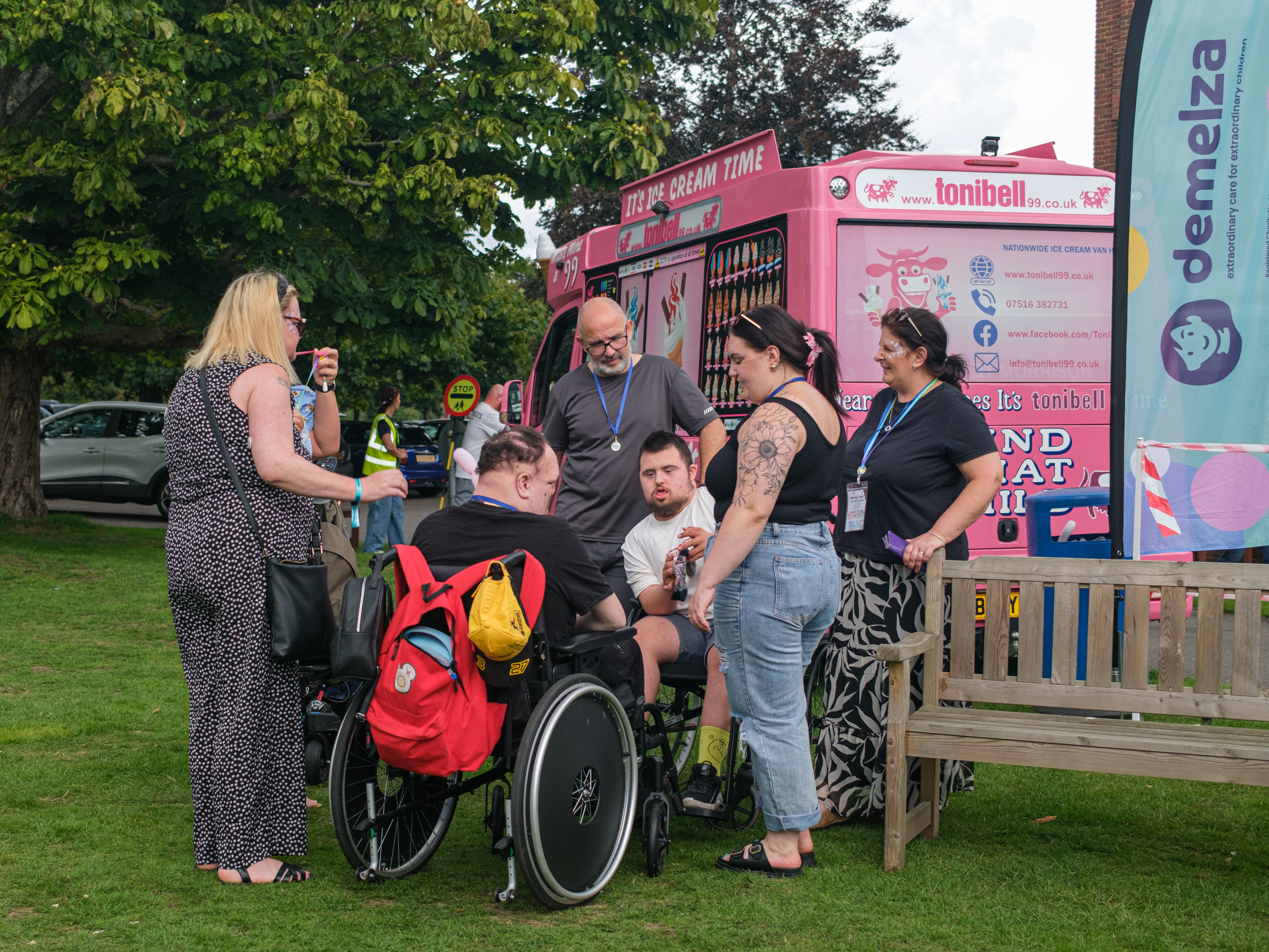 A family chatting with each out standing next to an ice cream truck at Kent family fest 2025