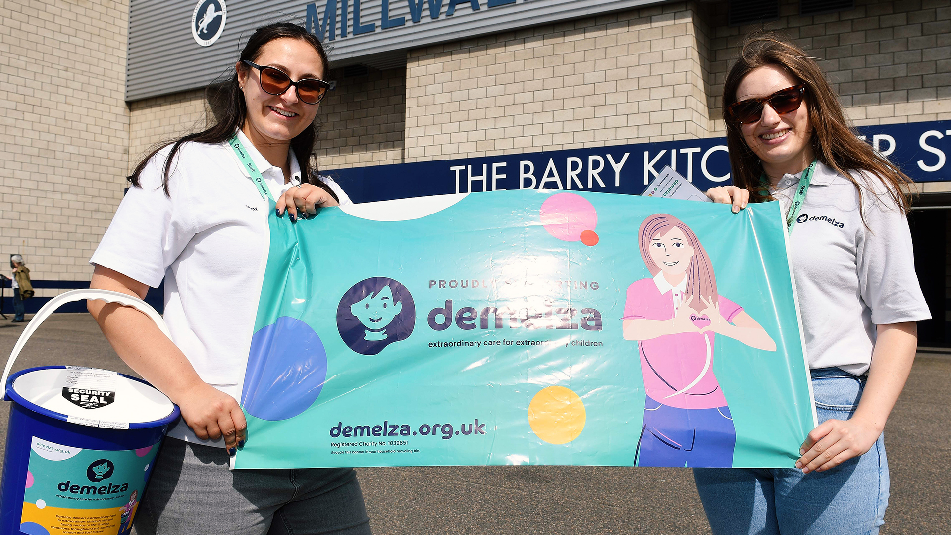 Community fundraisers with Demelza sign