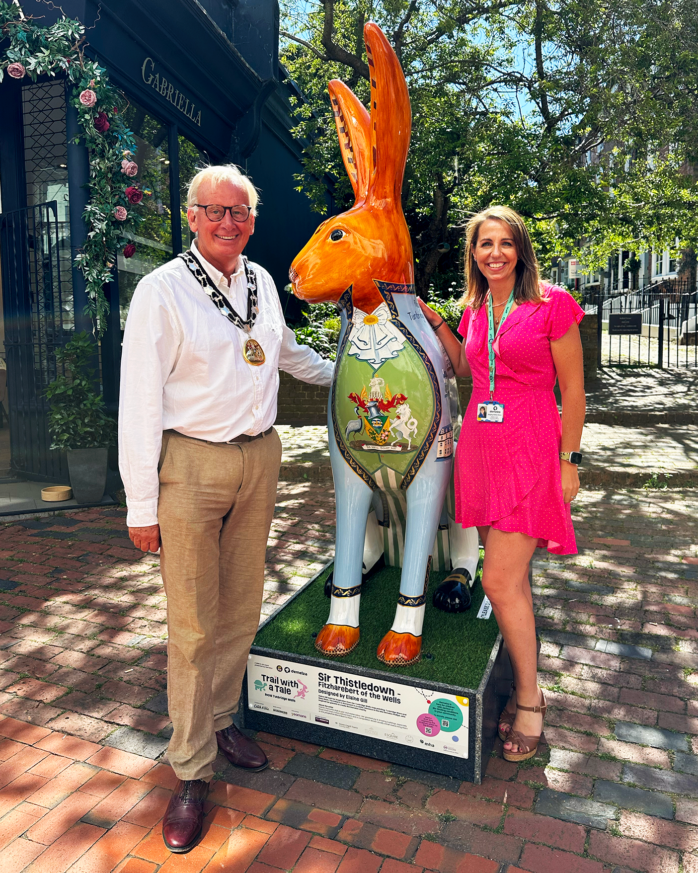 Image of Deputy CEO Hayley Richardson and Tunbridge Wells Mayor standing next to a sculpture during Trail with a Tale