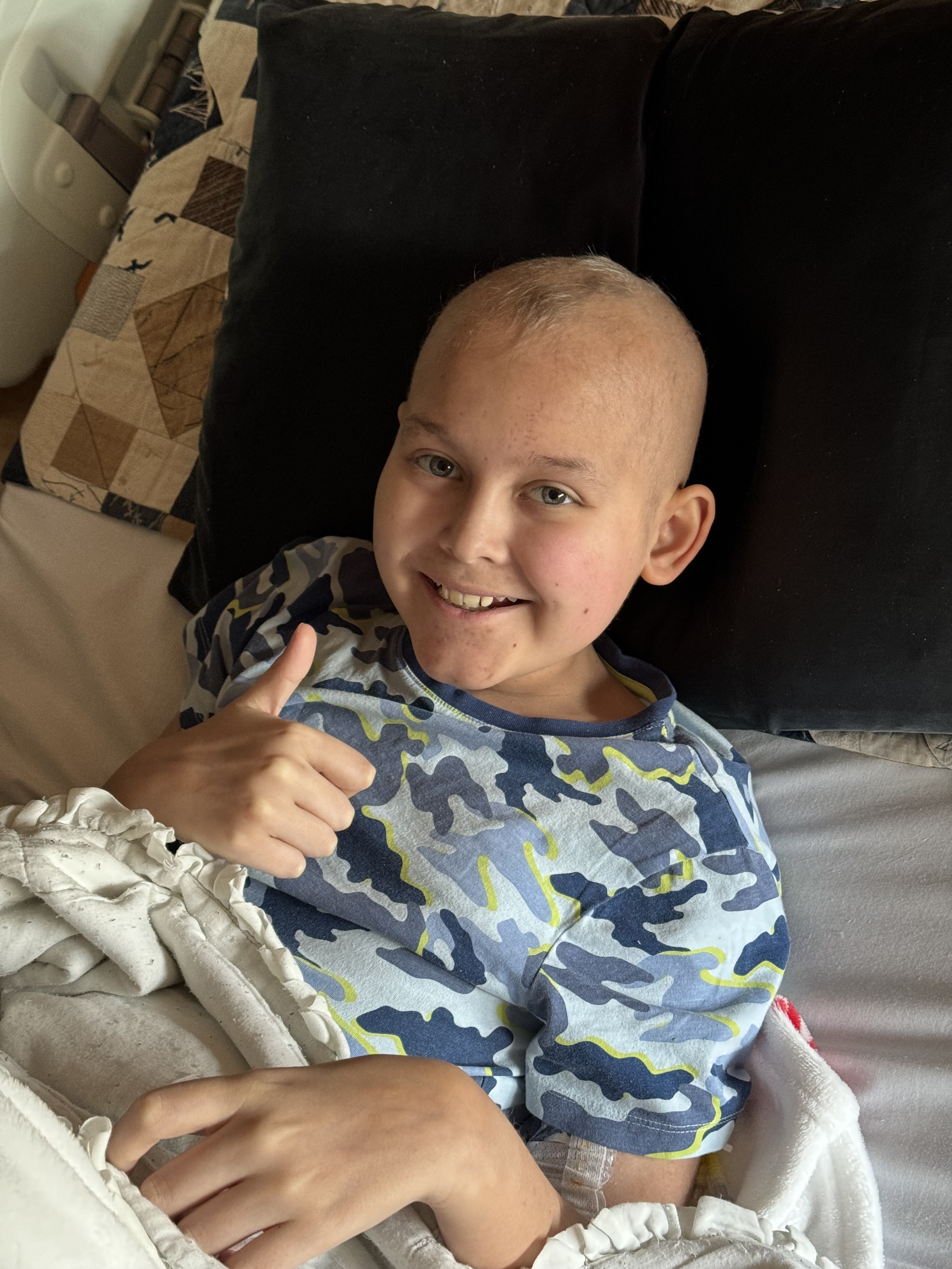Joshua giving a thumbs up