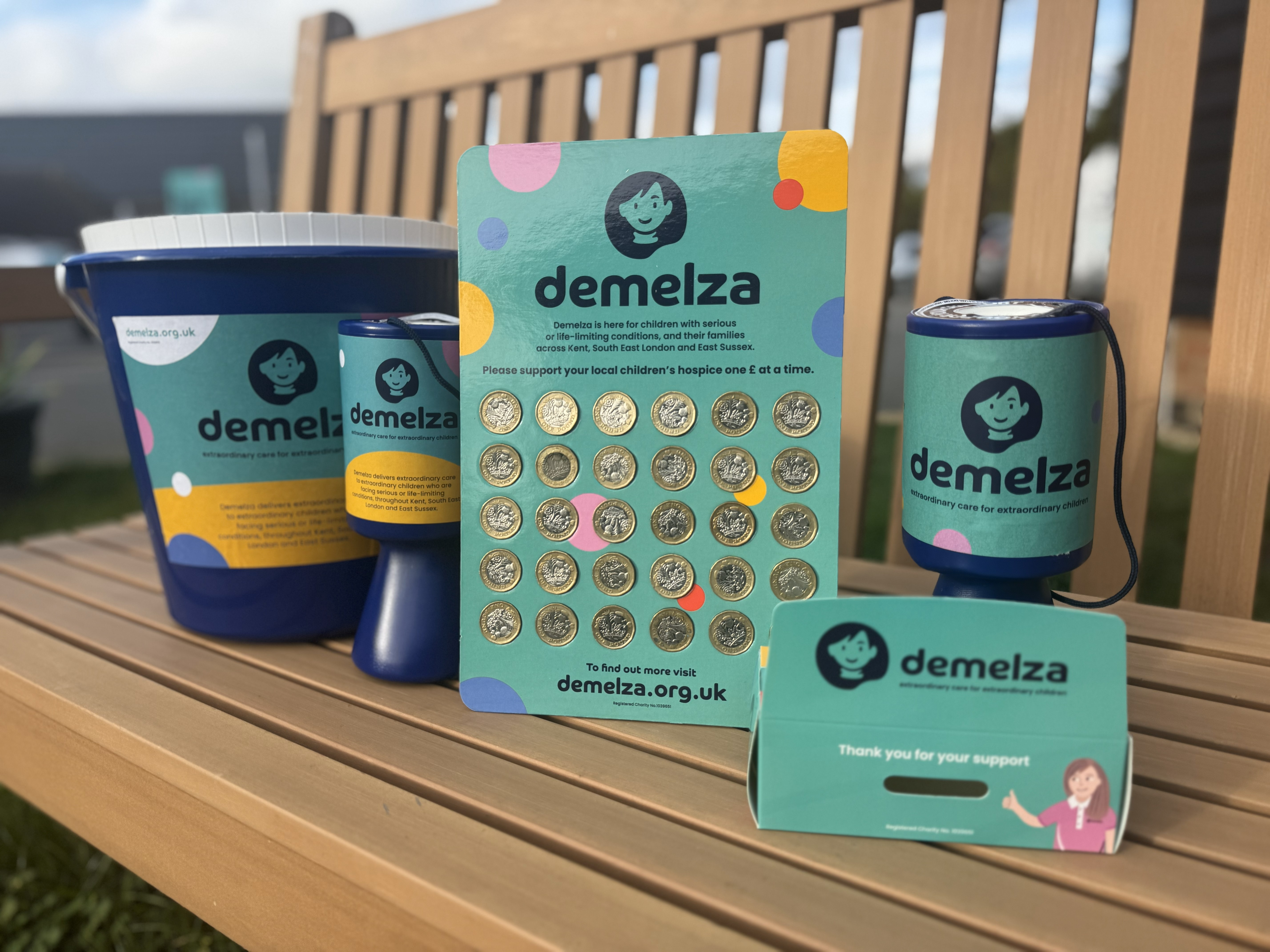 A variety of different fundraising equipment with Demelza branding