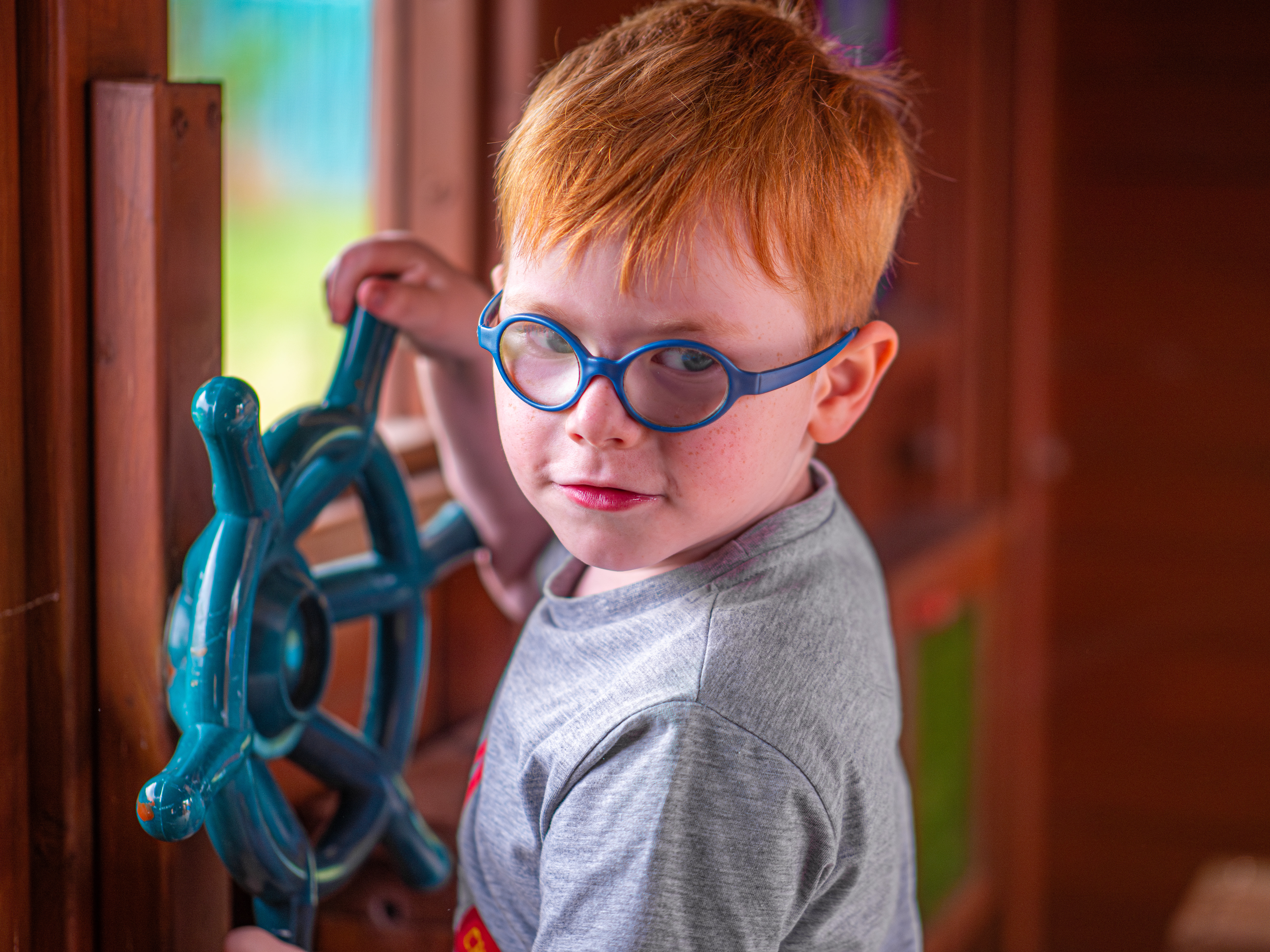 Image of child on the pirate ship in the playground
