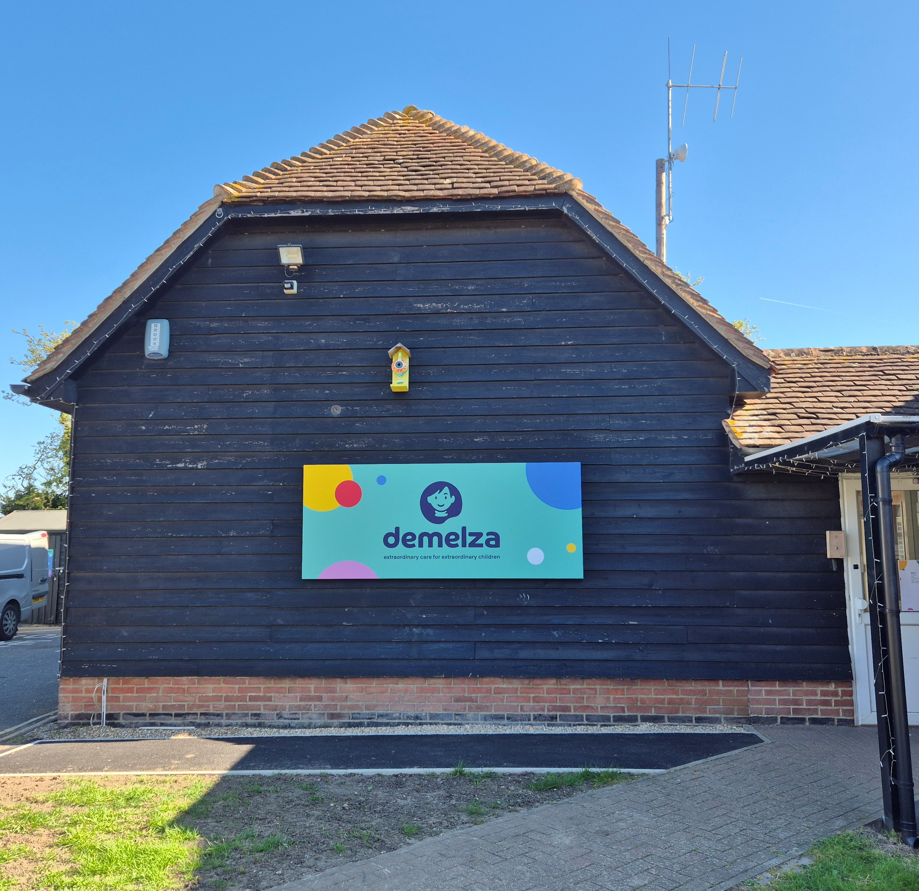 Demelza sign on The Barn building